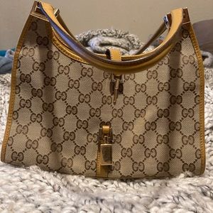Tan Gucci Jackie logo bag